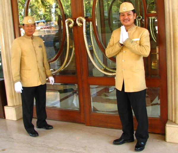 porters outside the Leela hotel